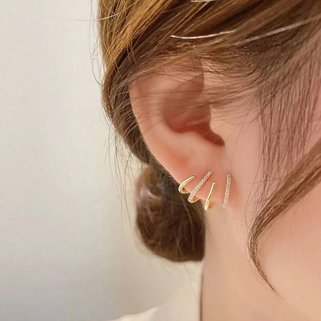 Modische glänzende Katzenkrallen-Ohrringe