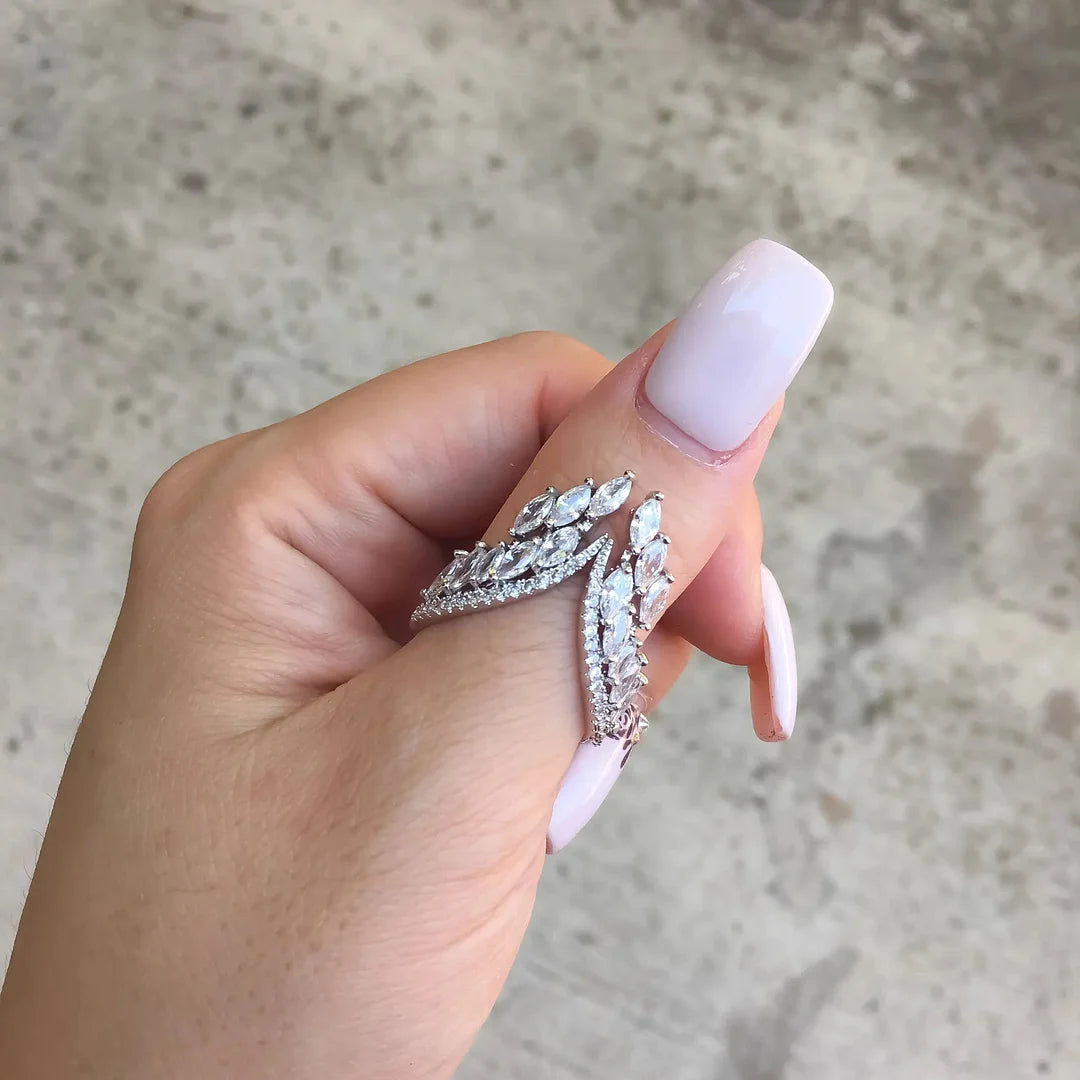 Set aus Diamantarmband und Ring mit Engelsflügeln